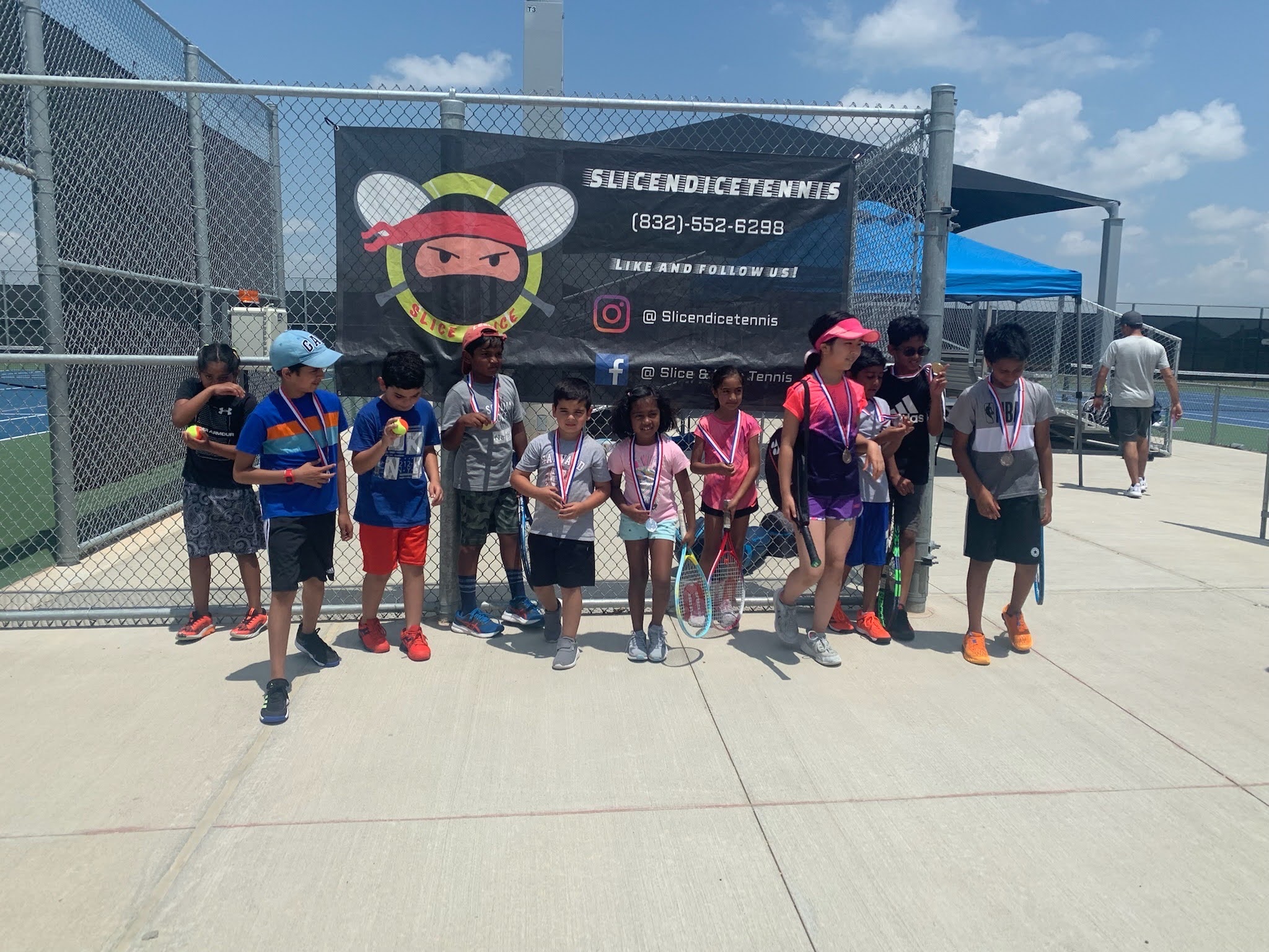 Junior tennis group class at Slice N Dice in Katy, TX